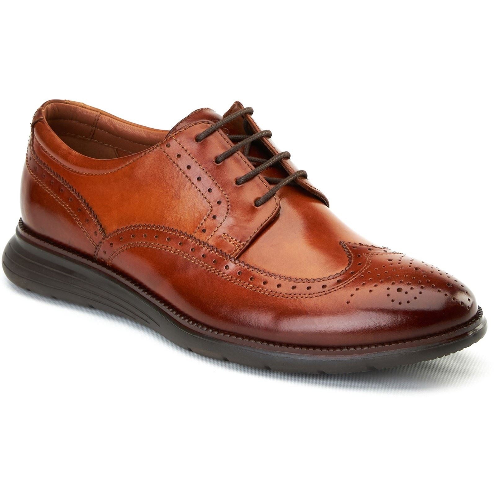 Burnt tan leather brogue shoes featuring decorative perforations, a sleek design, and a comfortable rubber sole with laces for a secure fit.