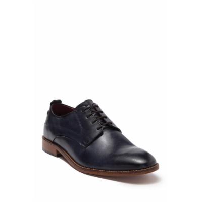 Navy leather men's shoe with a smooth finish, featuring a lace-up design, rounded toe, and a contrasting brown sole for a stylish look.