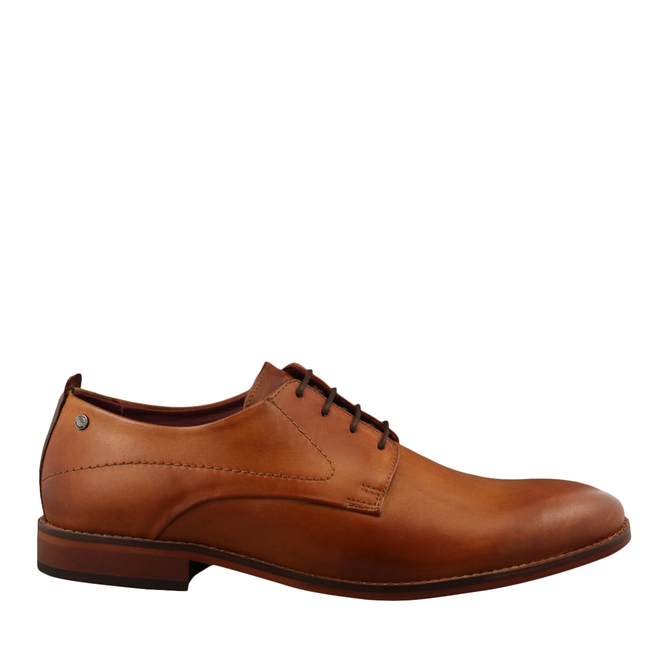 Tan leather dress shoe with a sleek design, featuring a rounded toe, lace-up front, and a subtle logo detail on the side, available in size 6.