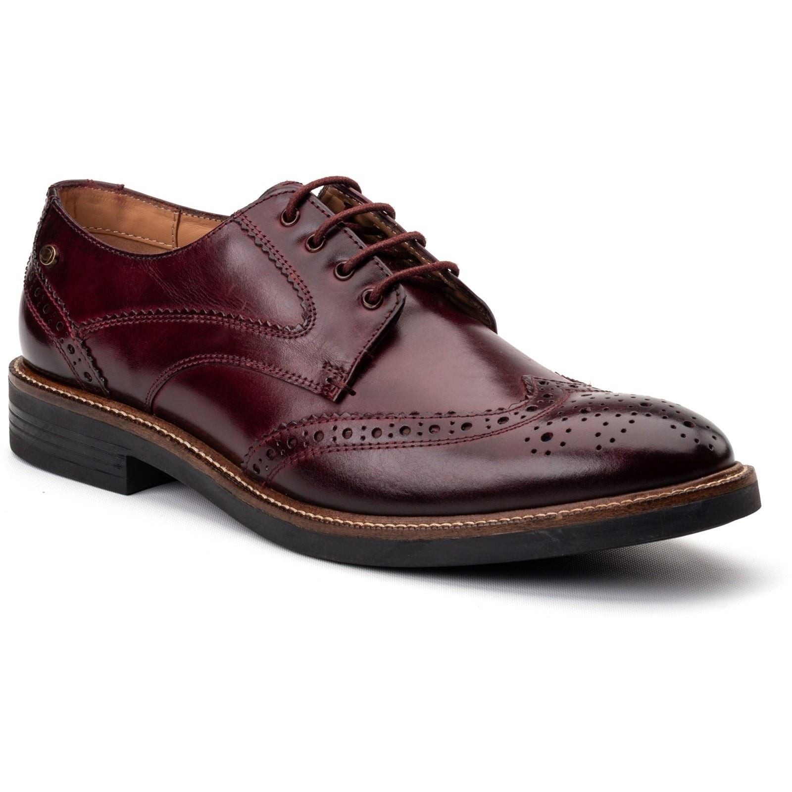 Bordo leather men's brogues featuring intricate perforations, a lace-up design, and a contrasting brown sole, showcasing a classic and stylish look.