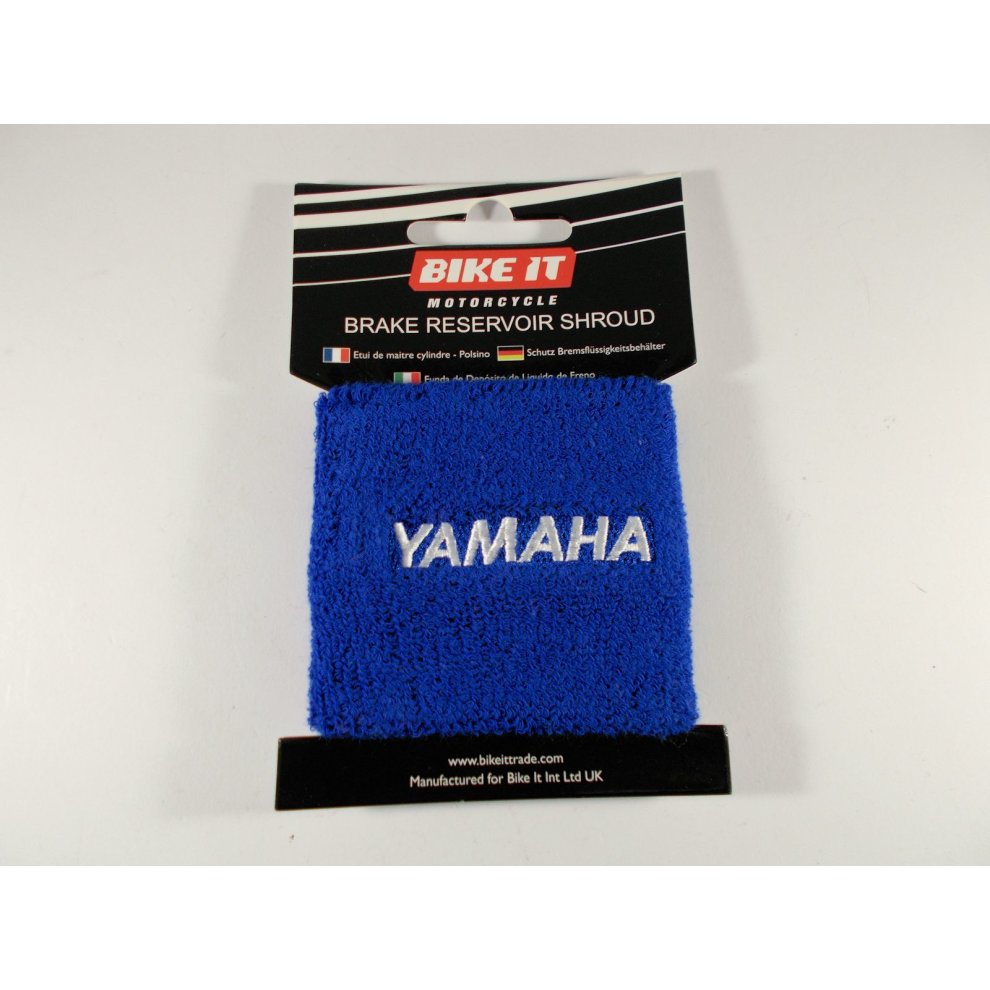 Bright blue, textured fabric brake cylinder reservoir protective shroud cover with "YAMAHA" embroidered in white, packaged with a Bike-It label.