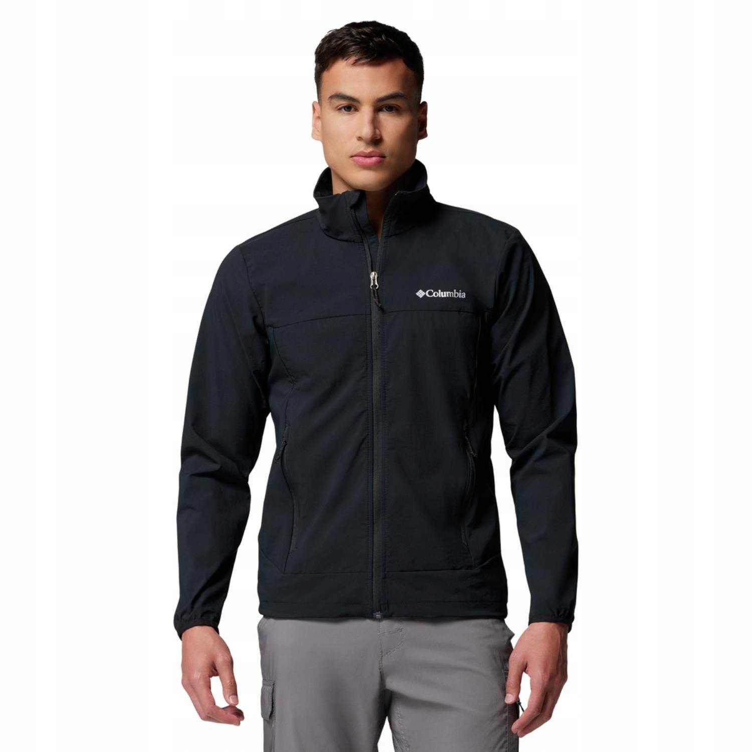 Men's Columbia Heather Canyon II black softshell jacket featuring a zip front, high collar, and logo on the chest, designed for comfort and outdoor activities.