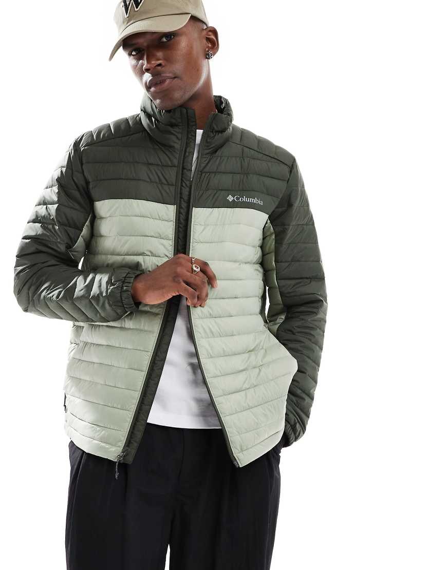 Men's Columbia Silver Falls II green puffer jacket featuring a two-tone design with a lighter green upper section, zip front, and high collar, worn by a model.