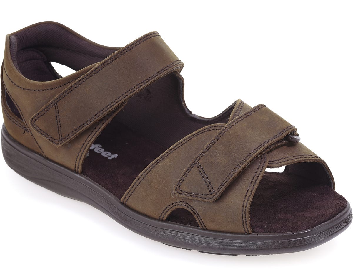 Brown leather men's sandals with extra wide fit, featuring adjustable Velcro straps and a cushioned insole, designed for comfort and support for swollen feet.