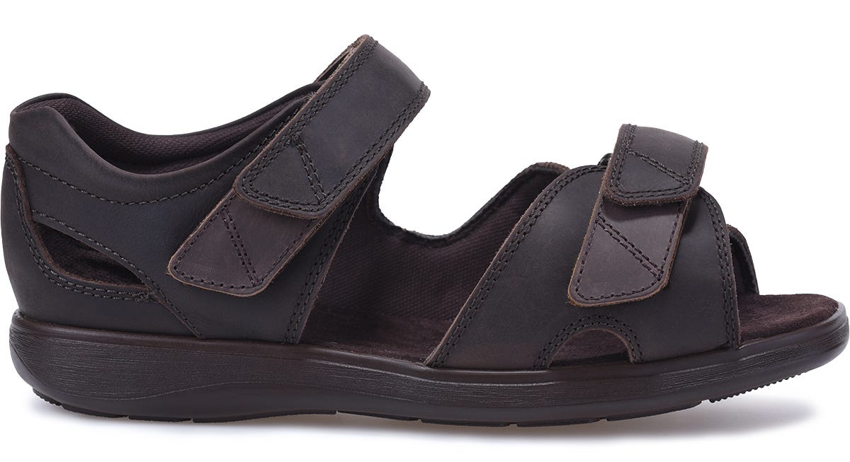 Brown leather sandals featuring adjustable straps, open toe design, and a cushioned sole for comfort.