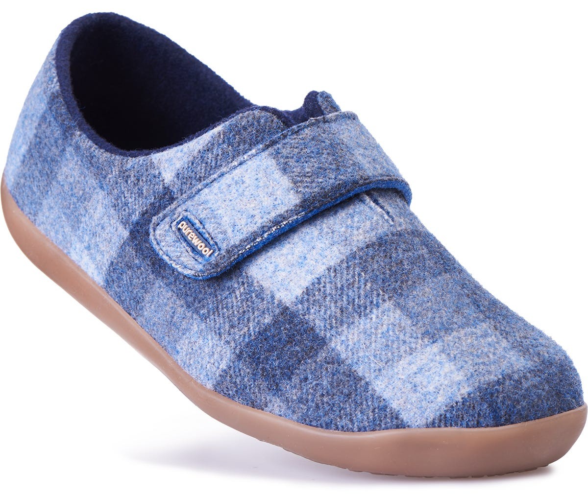 Blue and grey checked slippers with a soft wool material, featuring a Velcro strap and a sturdy brown rubber sole, designed for extra wide fit and comfort.