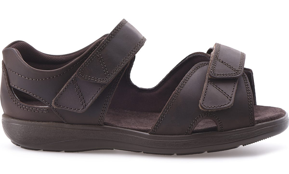 Brown leather sandals with adjustable straps, cushioned footbed, and cut-out details for breathability, designed for comfort and ease of wear.