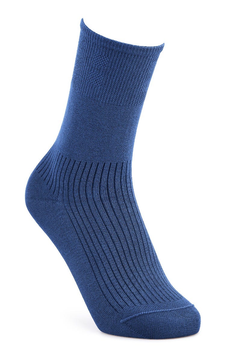 Extra roomy luxury bamboo socks in a rich blue color, featuring a seamless design and ribbed texture for comfort and breathability.