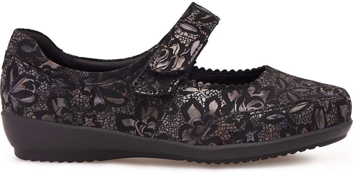 Black floral-patterned strap extension for shoes, featuring a velcro closure and a cushioned sole, designed for comfort and style.