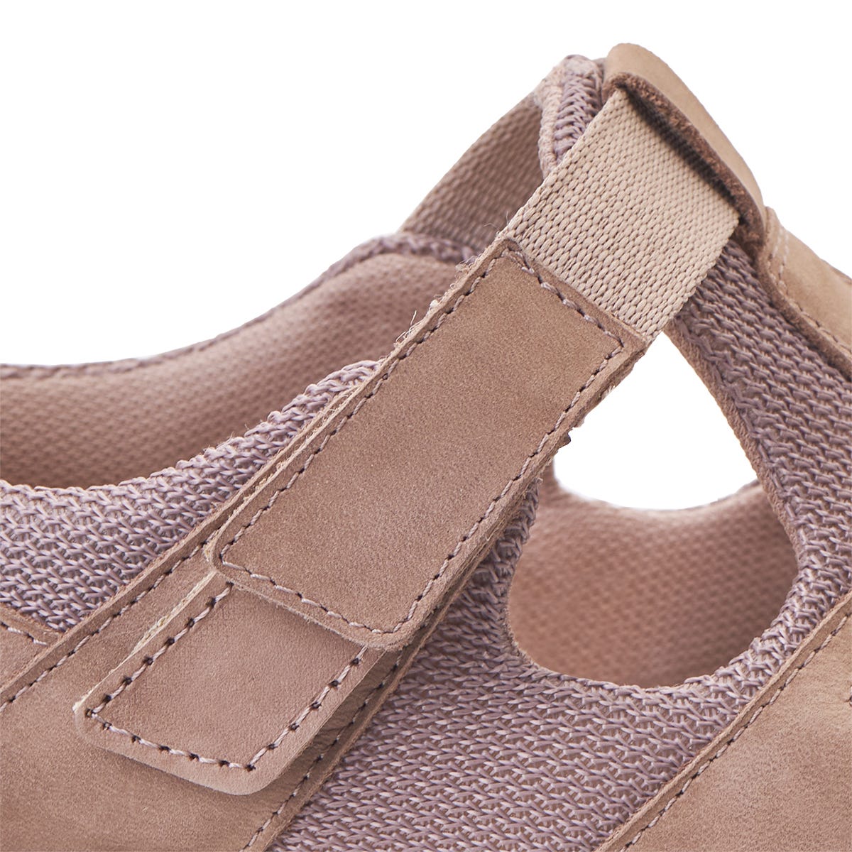 Light pink suede strap extension with a textured fabric panel, featuring a secure loop for easy adjustment and a comfortable fit.
