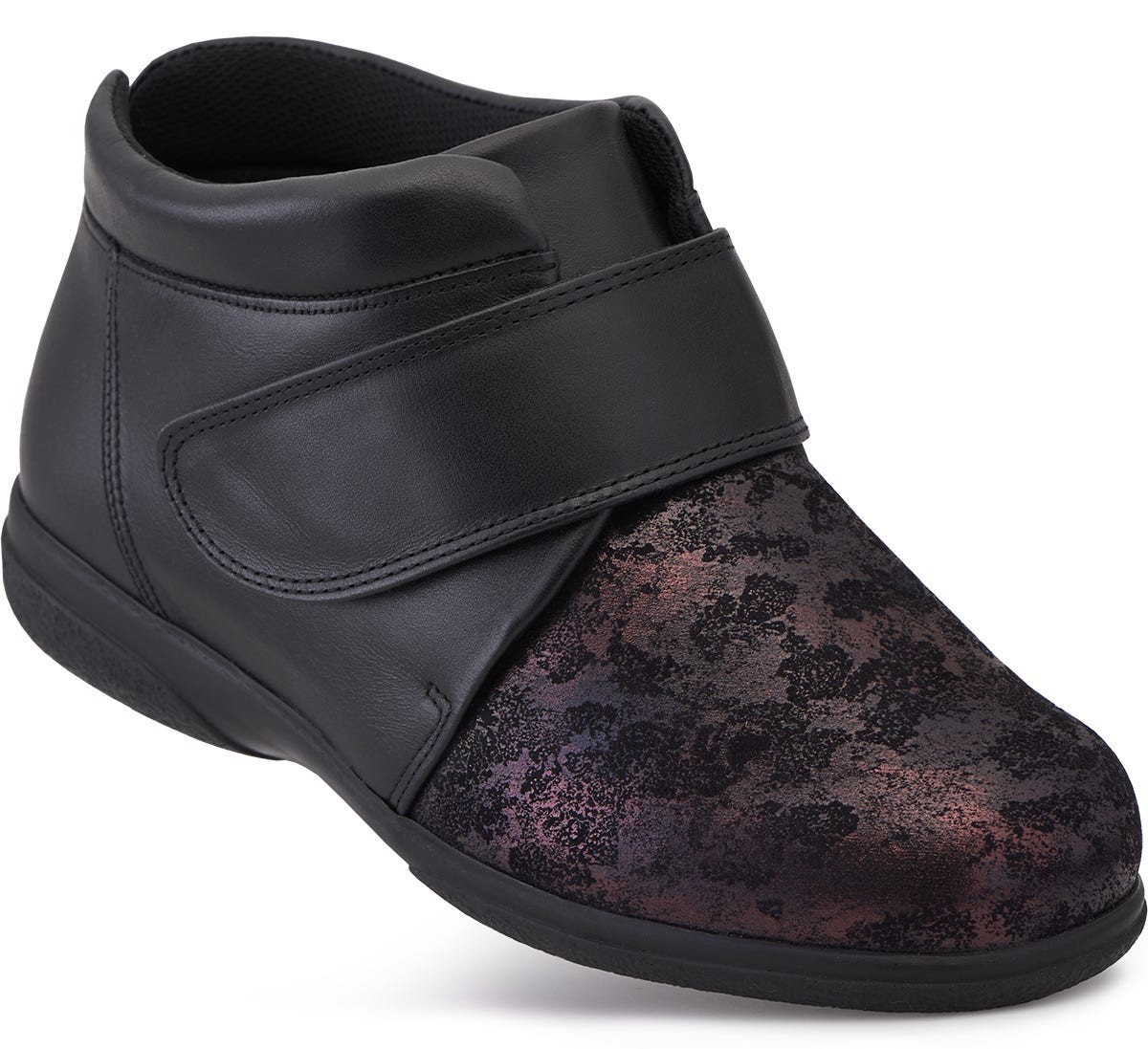 Black leather ankle boots with a velcro strap, featuring a textured dark floral pattern on the front, designed for extra wide fit and comfort for swollen feet.