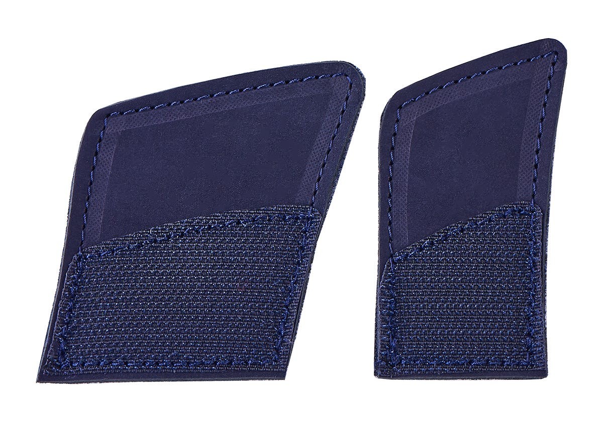 Navy blue strap extensions made of durable material with textured stitching, designed to provide extra length for comfort and fit.