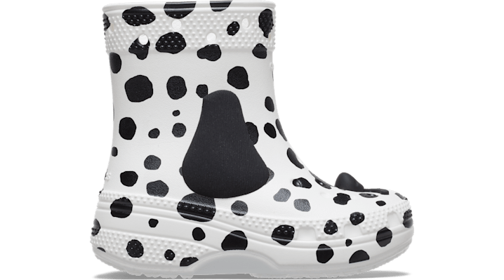 White EVA Wellington boots featuring a Dalmatian print with large black spots, rounded toe, and a textured sole for grip.
