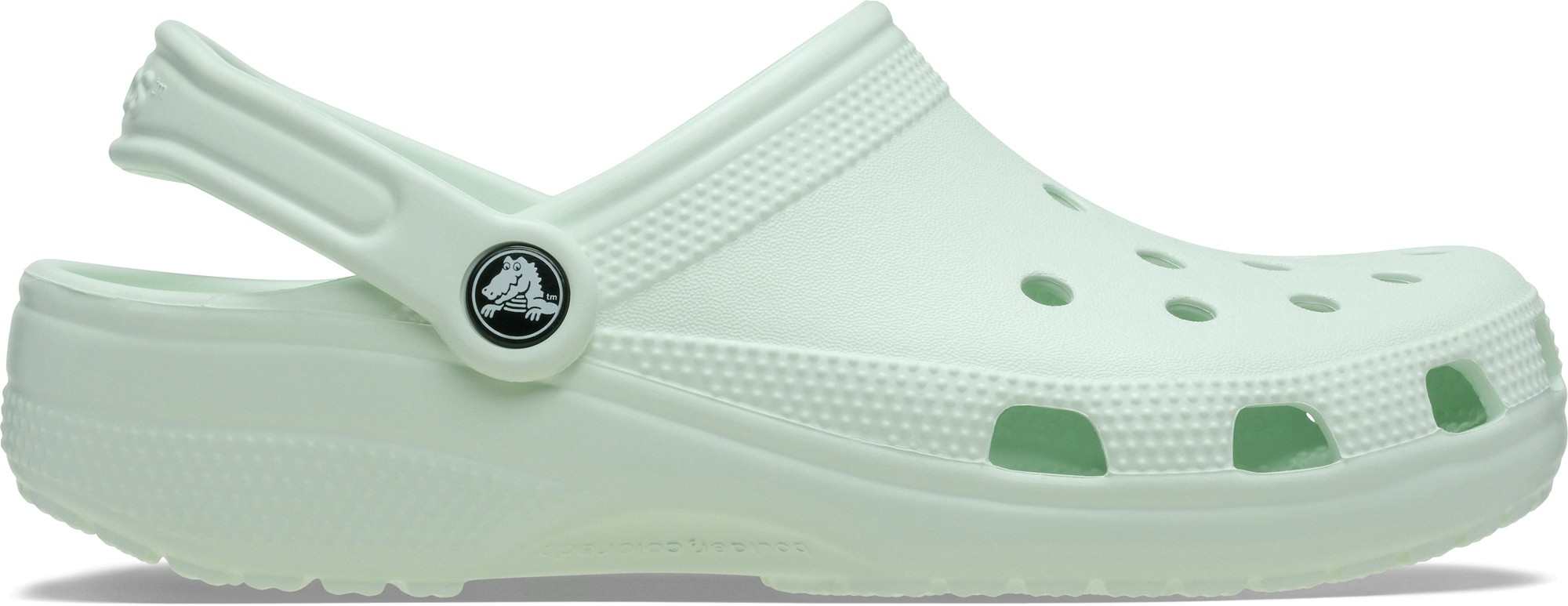 Green Crocs Classic Men's clogs made of lightweight, durable material featuring ventilation holes and a back strap for secure fit.