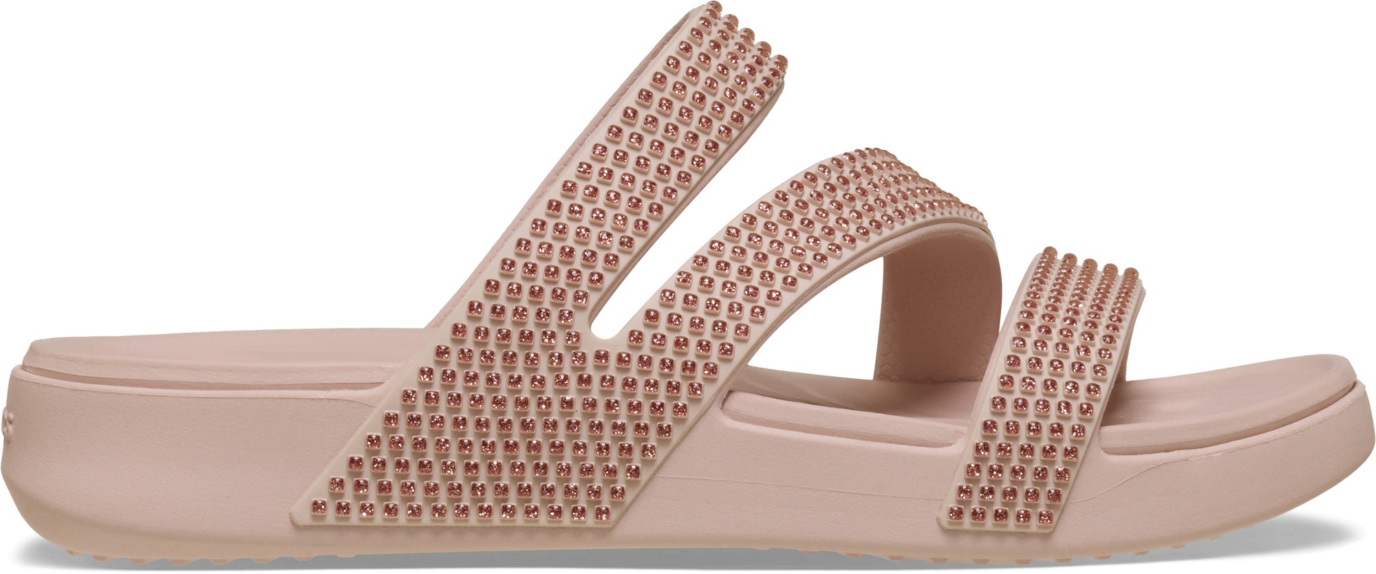 Light pink Crocs sandals featuring three strappy bands adorned with small gems, designed for women, with a comfortable flat sole.