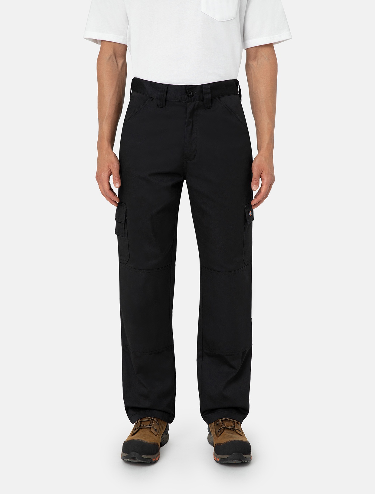 Black Dickies men's trousers in size 34S, featuring a relaxed fit, cargo pockets on the sides, and durable fabric, paired with a plain white t-shirt and brown work boots.