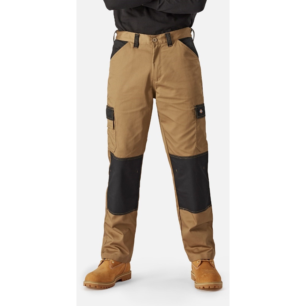 Brown Dickies men’s everyday trousers featuring black knee patches, multiple pockets, and a durable fabric, available in size 32S.