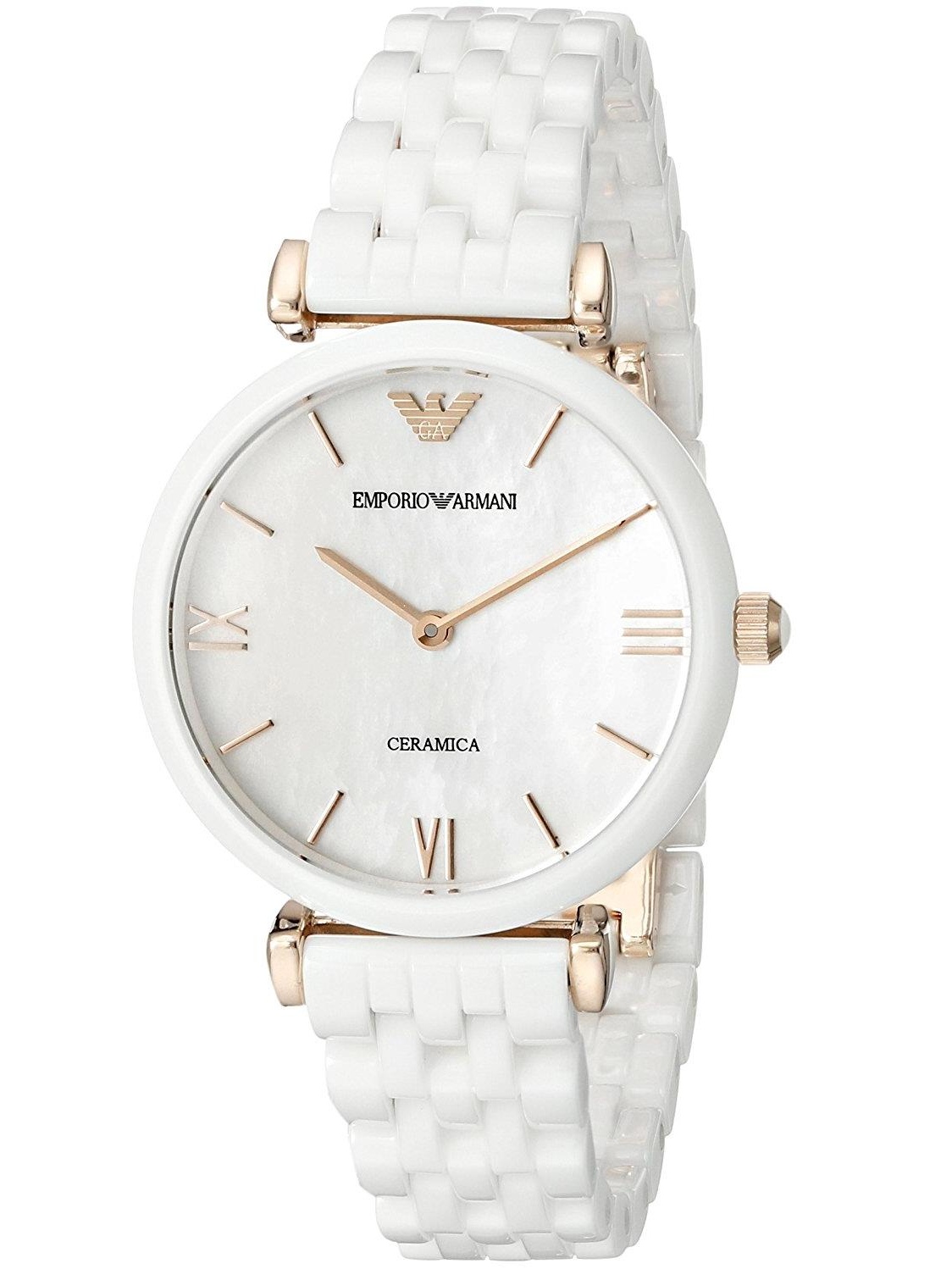 White ceramic ladies watch by Emporio Armani, featuring a mother-of-pearl dial, gold-tone accents, and Roman numeral markers on a woven ceramic bracelet.