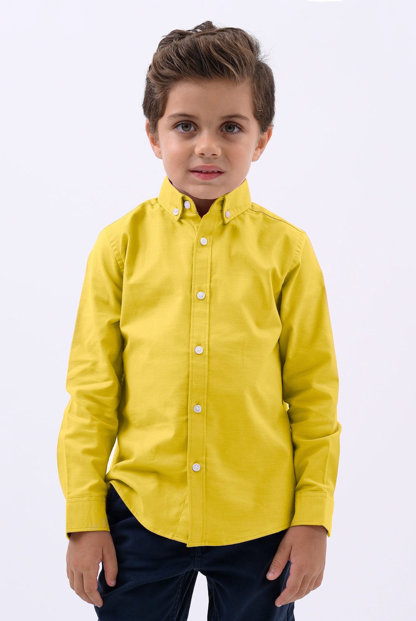 Yellow long-sleeve stretch Oxford shirt for boys aged 3-14 years, featuring a button-down collar and front buttons, made from a soft, durable fabric.