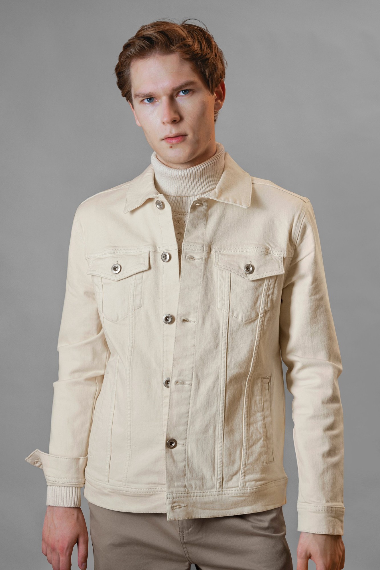 Men's essential classic ecru denim jacket featuring a button-up front, two chest pockets, and a tailored fit, made from durable denim material.