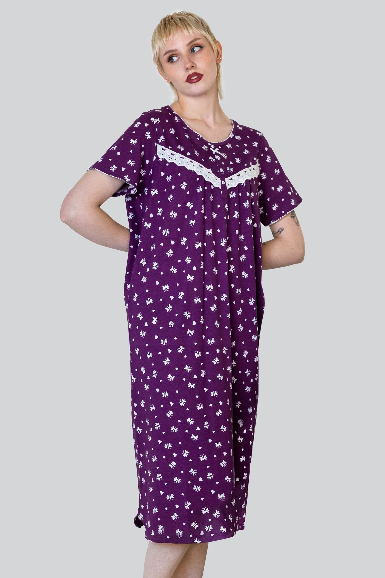 Purple short-sleeve nightwear featuring a butterfly print and lace trims, designed for women in UK size 18, with a relaxed fit and knee-length design.