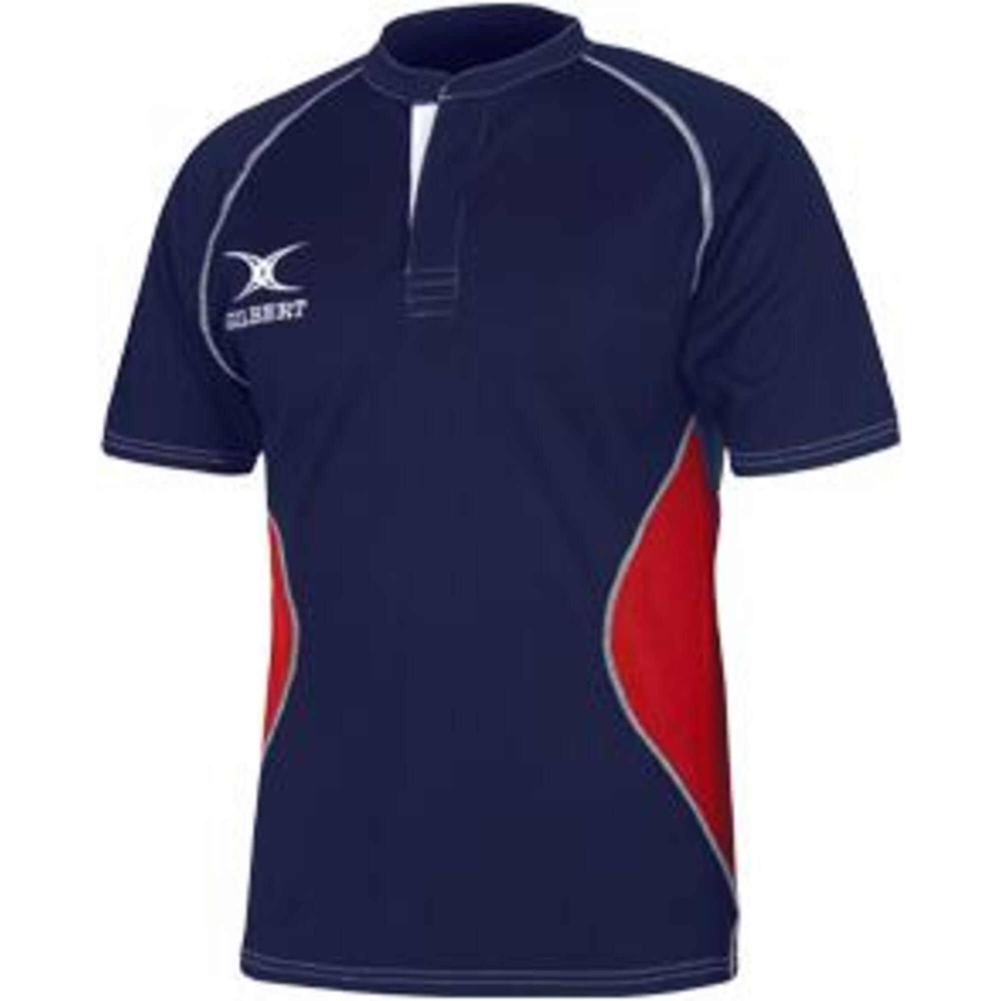 Blue short sleeve performance t-shirt for kids, featuring a collar, red and white accents, and the Gilbert logo on the front. Made from breathable material for active wear.