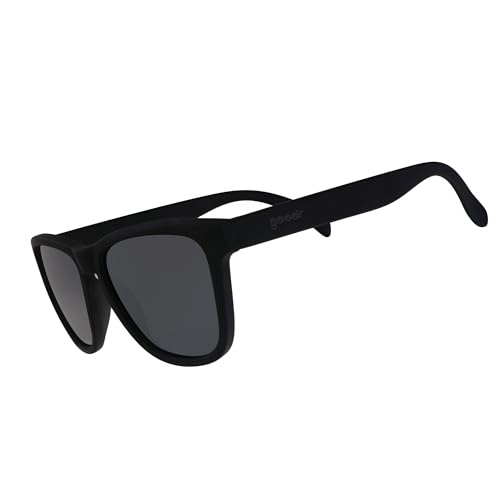 Unisex sunglasses with a sleek black frame and dark lenses, featuring a modern design and lightweight material, ideal for stylish sun protection.