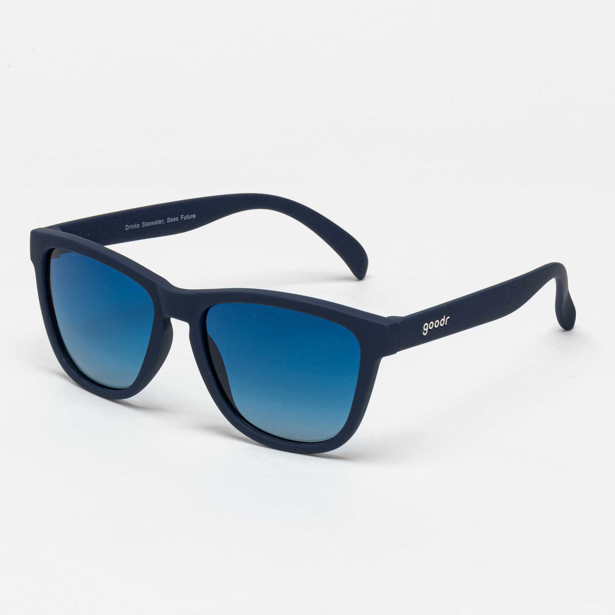 Navy blue, non-mirrored sunglasses with polarized lenses featuring a gradient blue tint, lightweight plastic frame, and stylish Goodr branding on the temple.