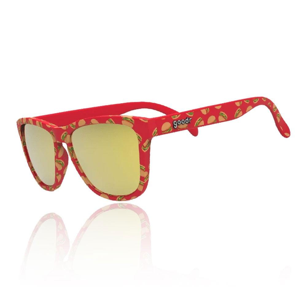 Red sunglasses with a taco print on the frame, featuring yellow mirrored lenses and a lightweight design, ideal for runners and outdoor activities.
