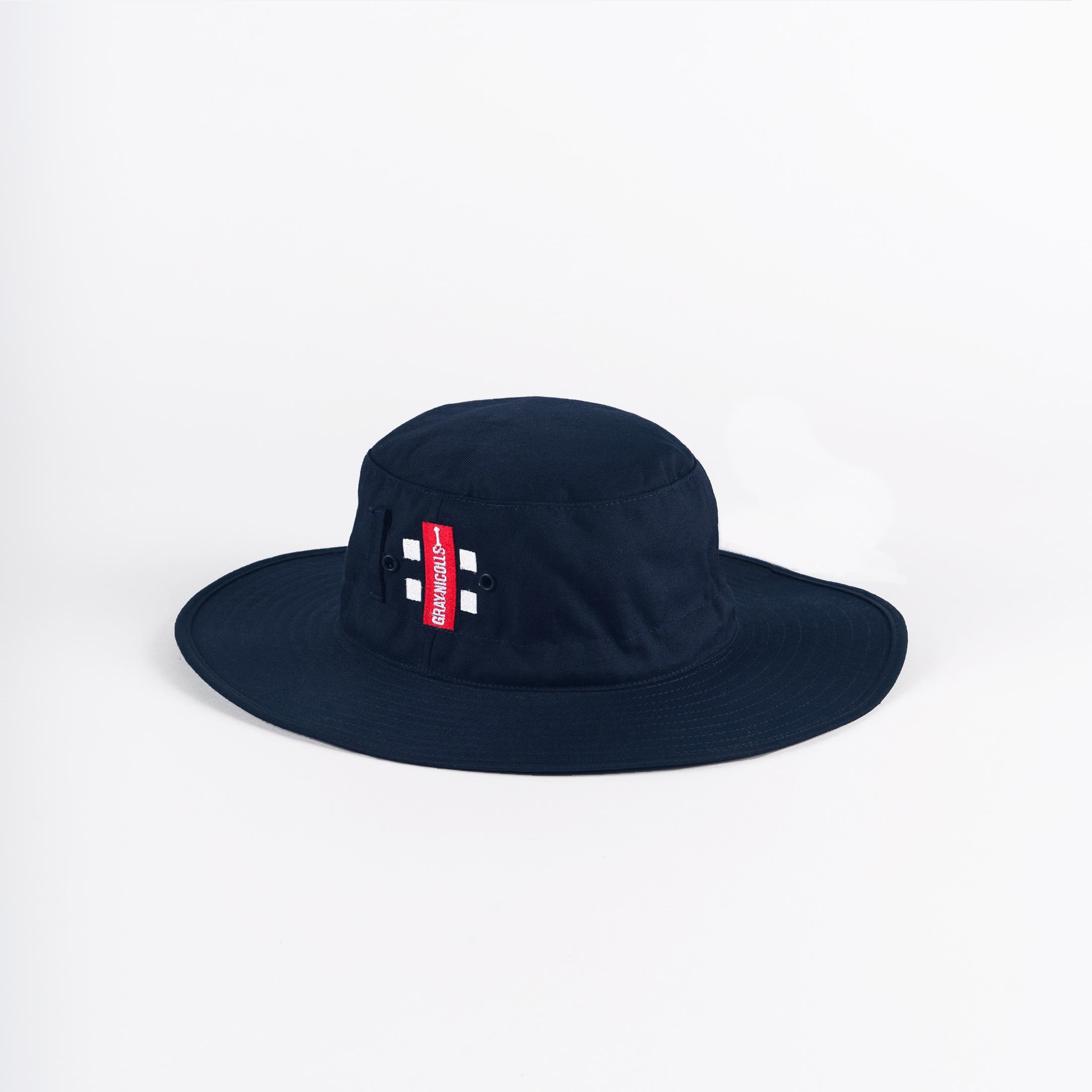 Navy blue sun hat with a wide brim, made of durable fabric, featuring a red and white tag on the side, designed for outdoor use by Gray-Nicolls.