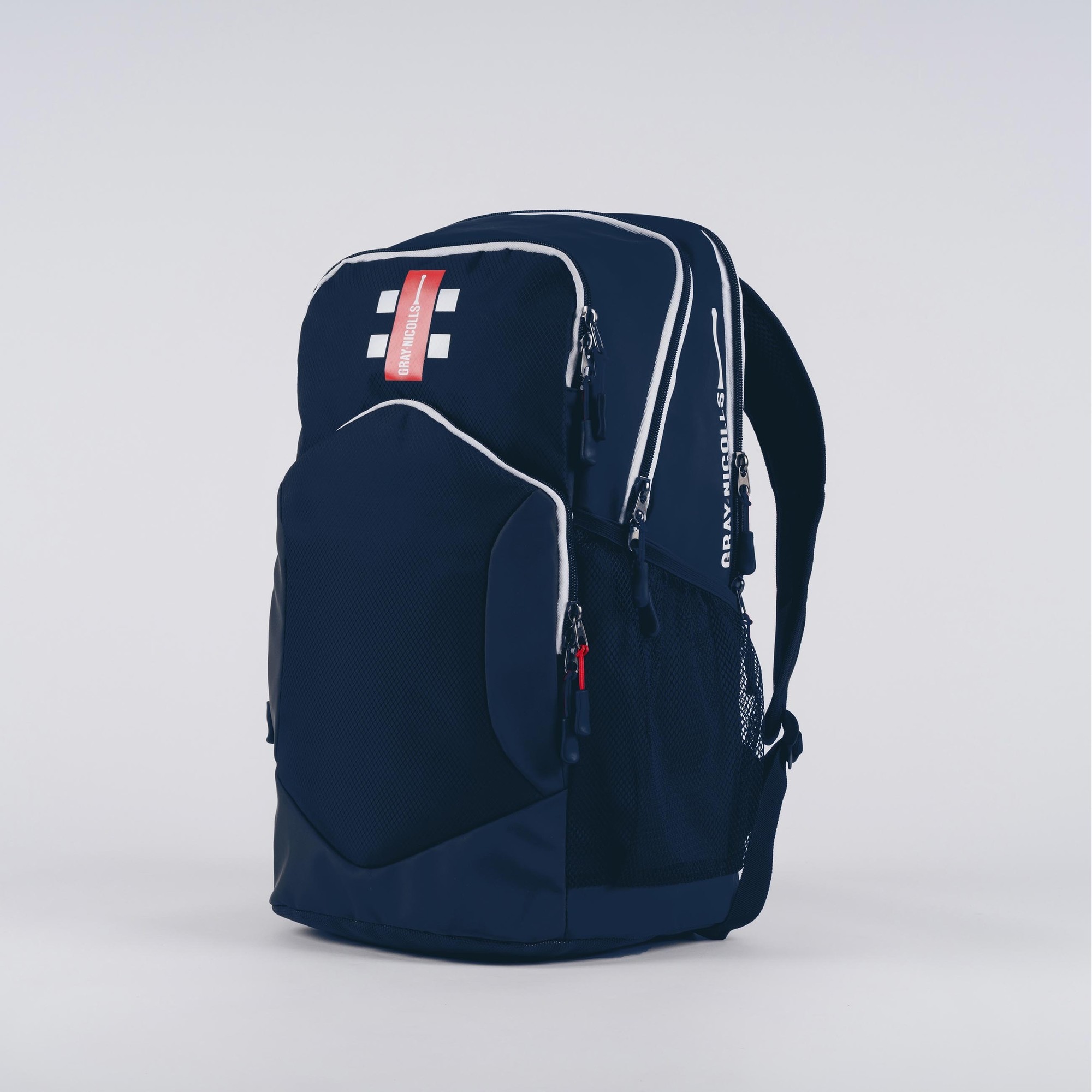 Black Gray-Nicolls Team Rucksack featuring a sleek design, multiple compartments, mesh side pockets, and red accents on zippers and a label.