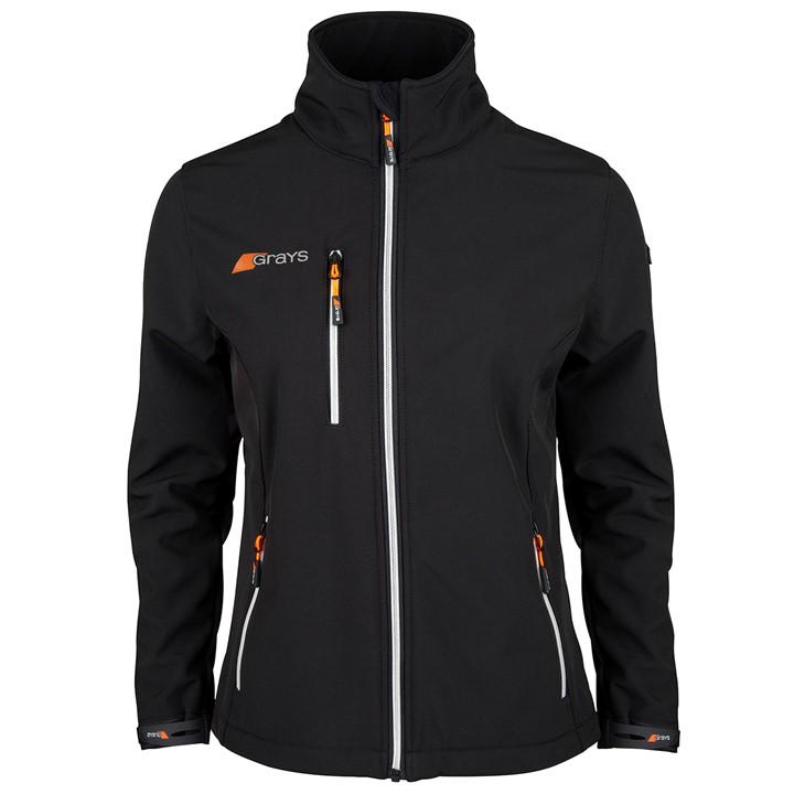 Black soft shell jacket for women by Grays Hockey, featuring a high collar, zippered pockets with orange accents, and a sleek, fitted design.