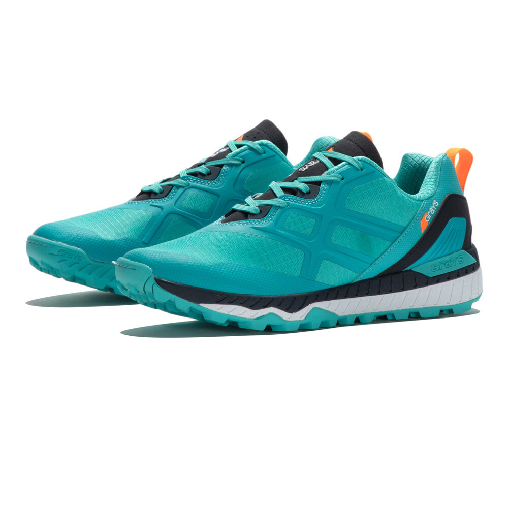 Turquoise field hockey shoes with a breathable mesh upper, featuring black accents, a cushioned sole, and an orange heel tab for enhanced visibility and comfort.