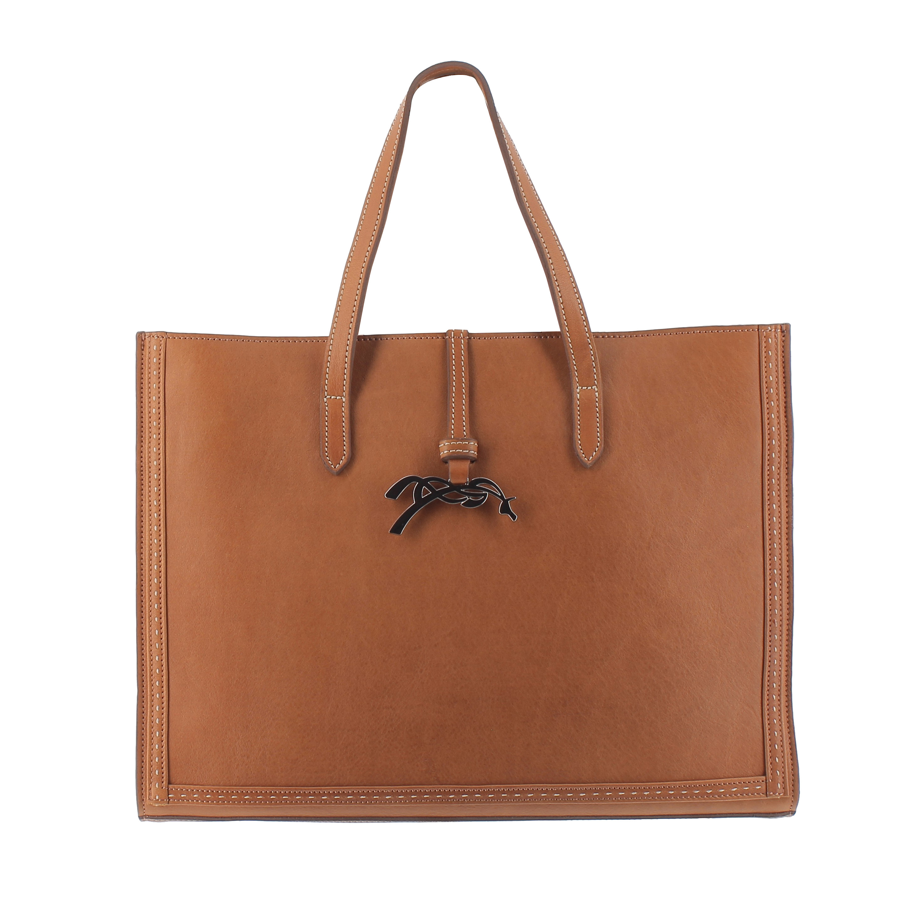 Tan leather handbag with two sturdy handles, featuring a decorative black bow and contrasting white stitching along the edges.