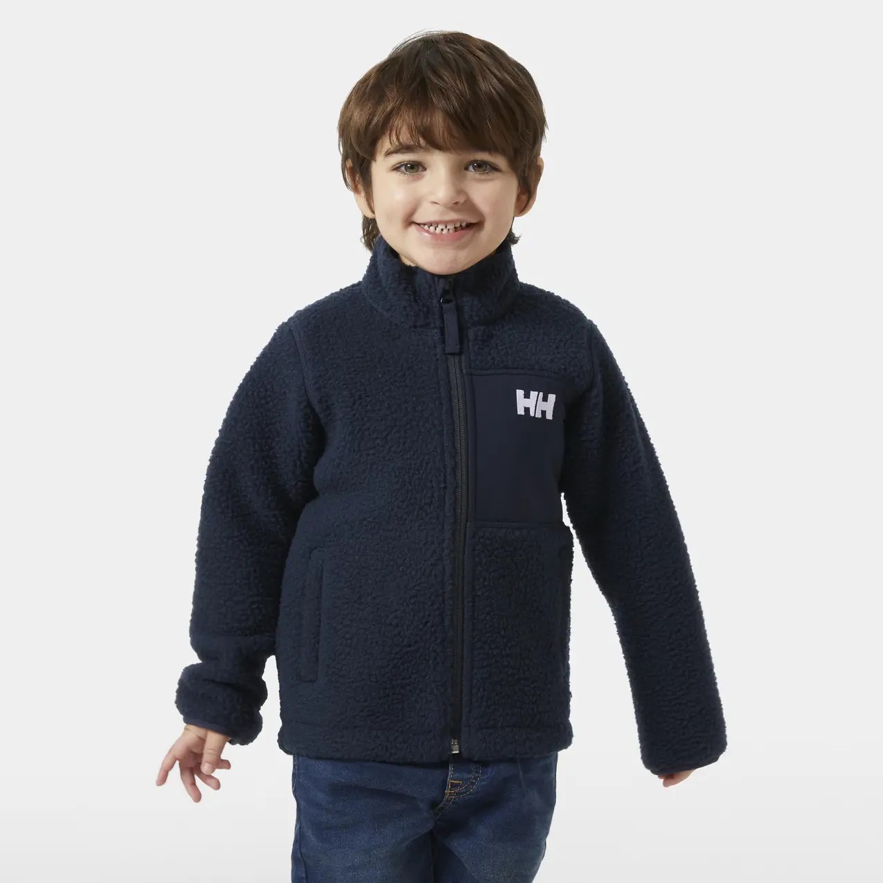 Navy blue fleece jacket for children featuring a high collar, zip closure, and a chest pocket with the Helly Hansen logo.