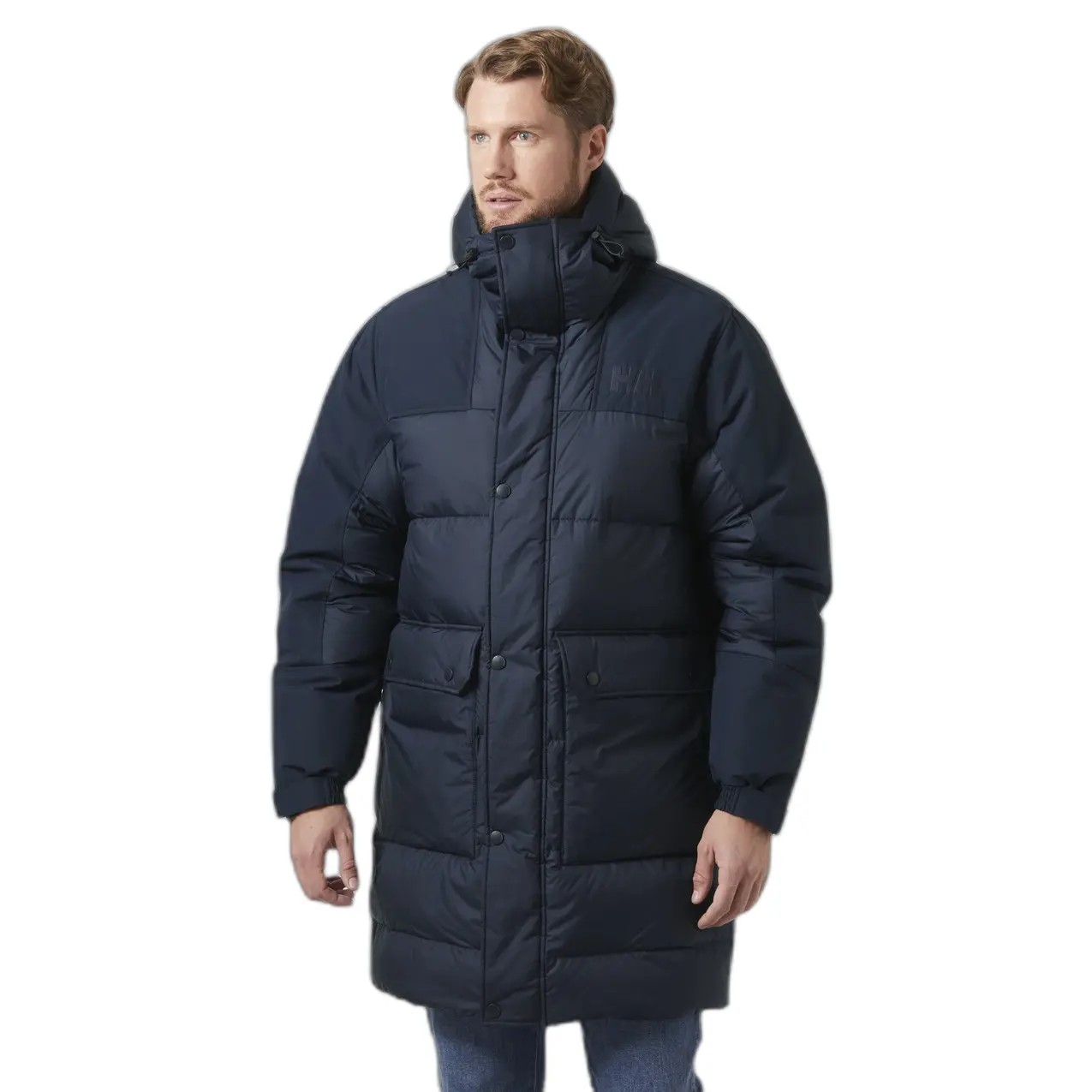Navy blue parka jacket with a padded design, high collar, adjustable hood, and front button closure, worn by a man standing against a white background.