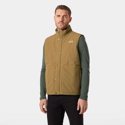 Sleeveless khaki jacket by Helly Hansen features a quilted design, snap buttons, and a logo on the chest, worn over a long-sleeve green shirt.