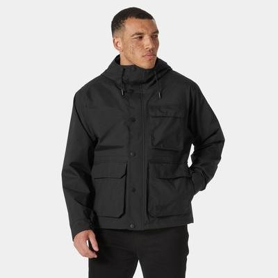 Black waterproof casual rain jacket by Helly Hansen, featuring a hood, multiple front pockets, and a relaxed fit, designed for utility and comfort in wet conditions.