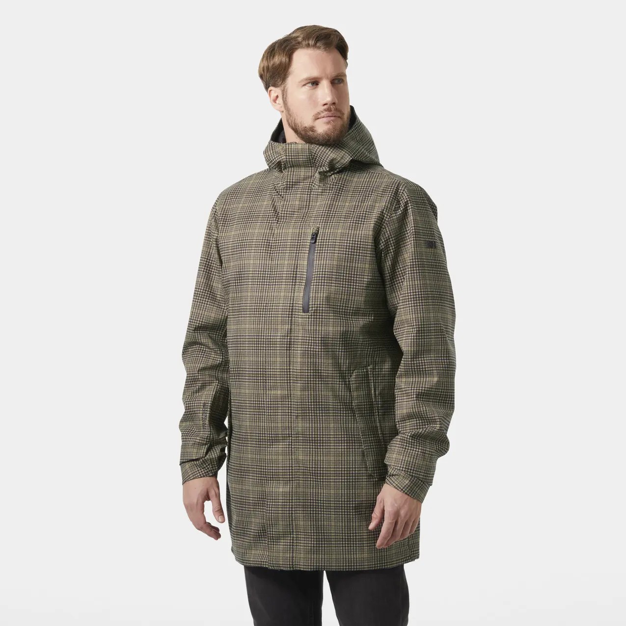 Hooded waterproof jacket in a green and brown checkered pattern, featuring a front zipper pocket and a relaxed fit, ideal for outdoor activities.