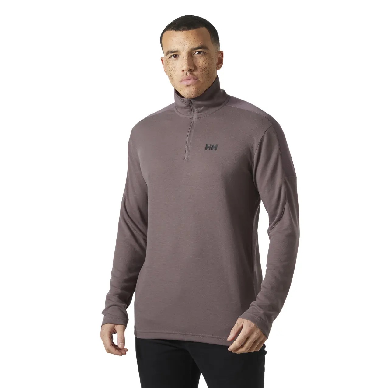 Light brown 1/4 zip sweater by Helly Hansen, featuring a high collar, long sleeves, and the brand's logo on the chest, made from a soft, breathable material.
