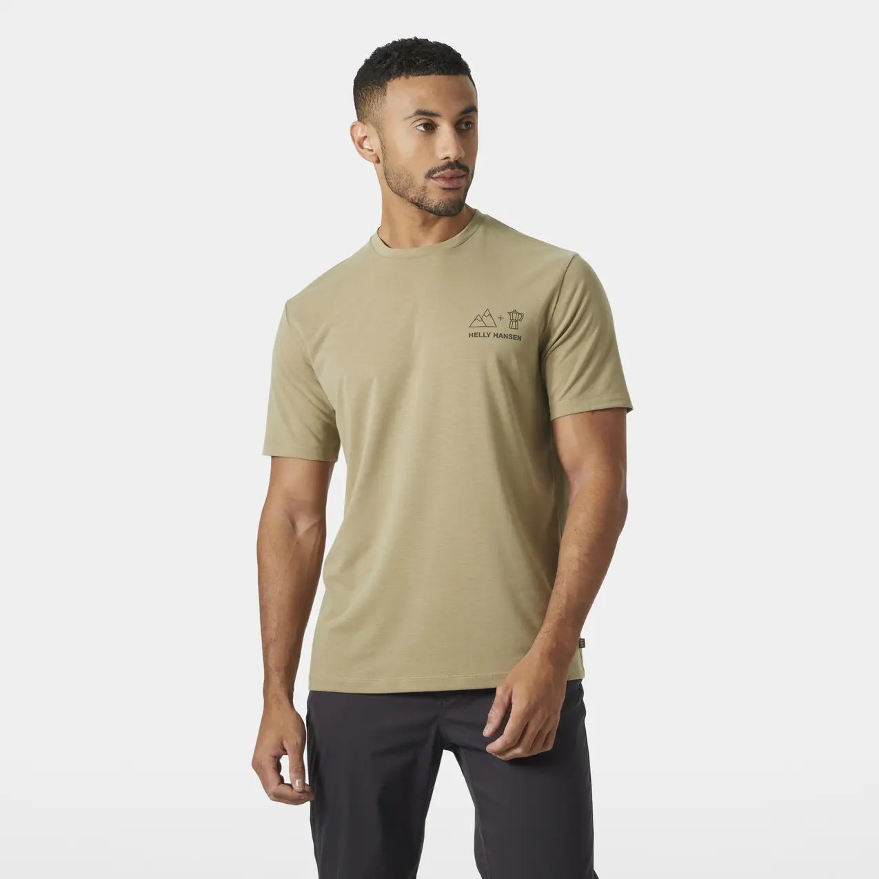 Light khaki short-sleeve T-shirt featuring a small Helly Hansen logo and mountain graphic on the chest, made from soft, breathable material.