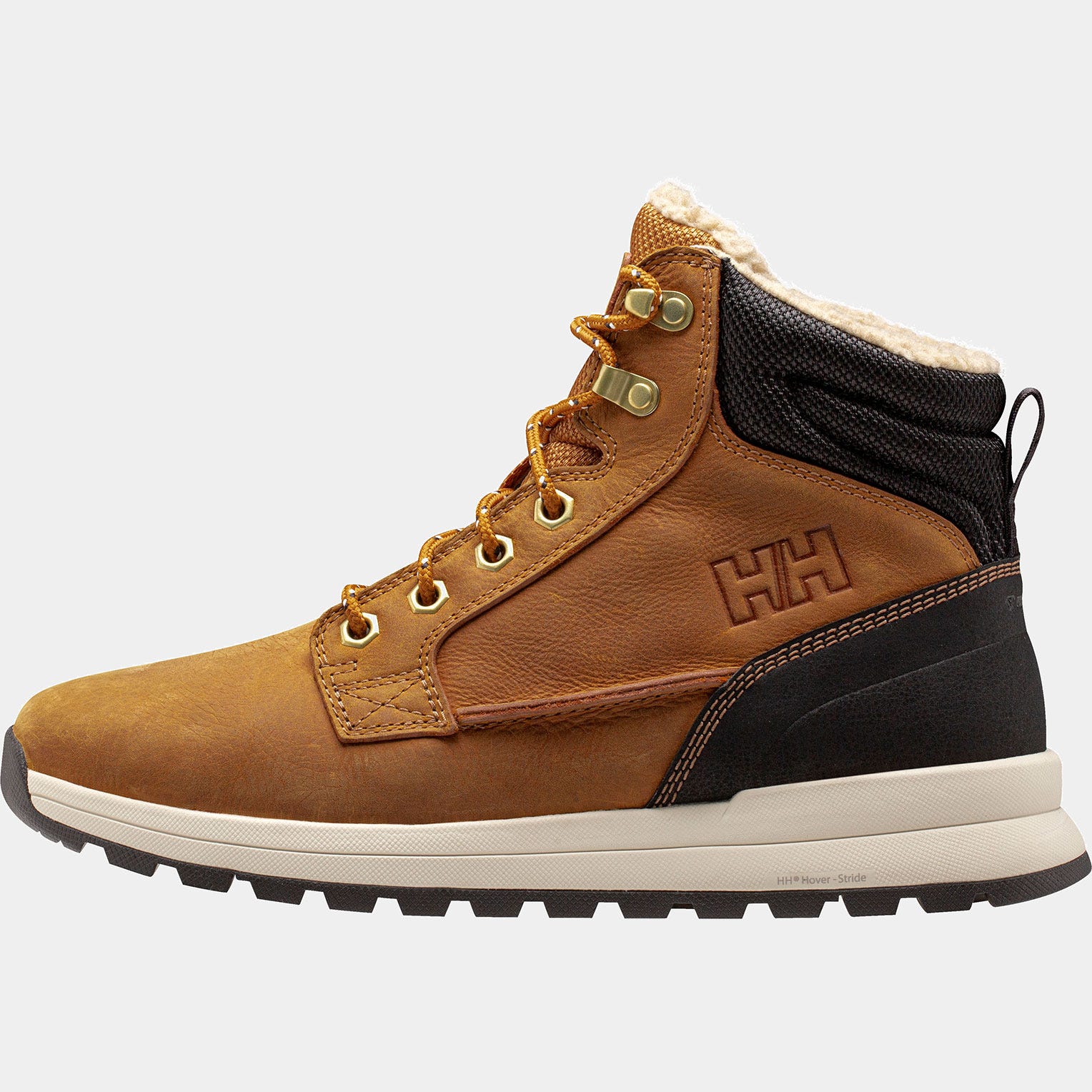 Light brown Helly Hansen Men Kelvin LX winter boots with a soft fur lining, metal eyelets, and a black ankle collar, featuring a sturdy rubber sole and embossed logo. Size 9.