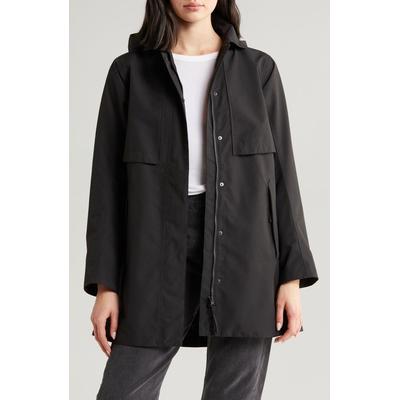 Women's Helly Hansen Lilja waterproof jacket in black, featuring a relaxed fit, snap buttons, a hood, and two front pockets, made from durable, water-resistant material.