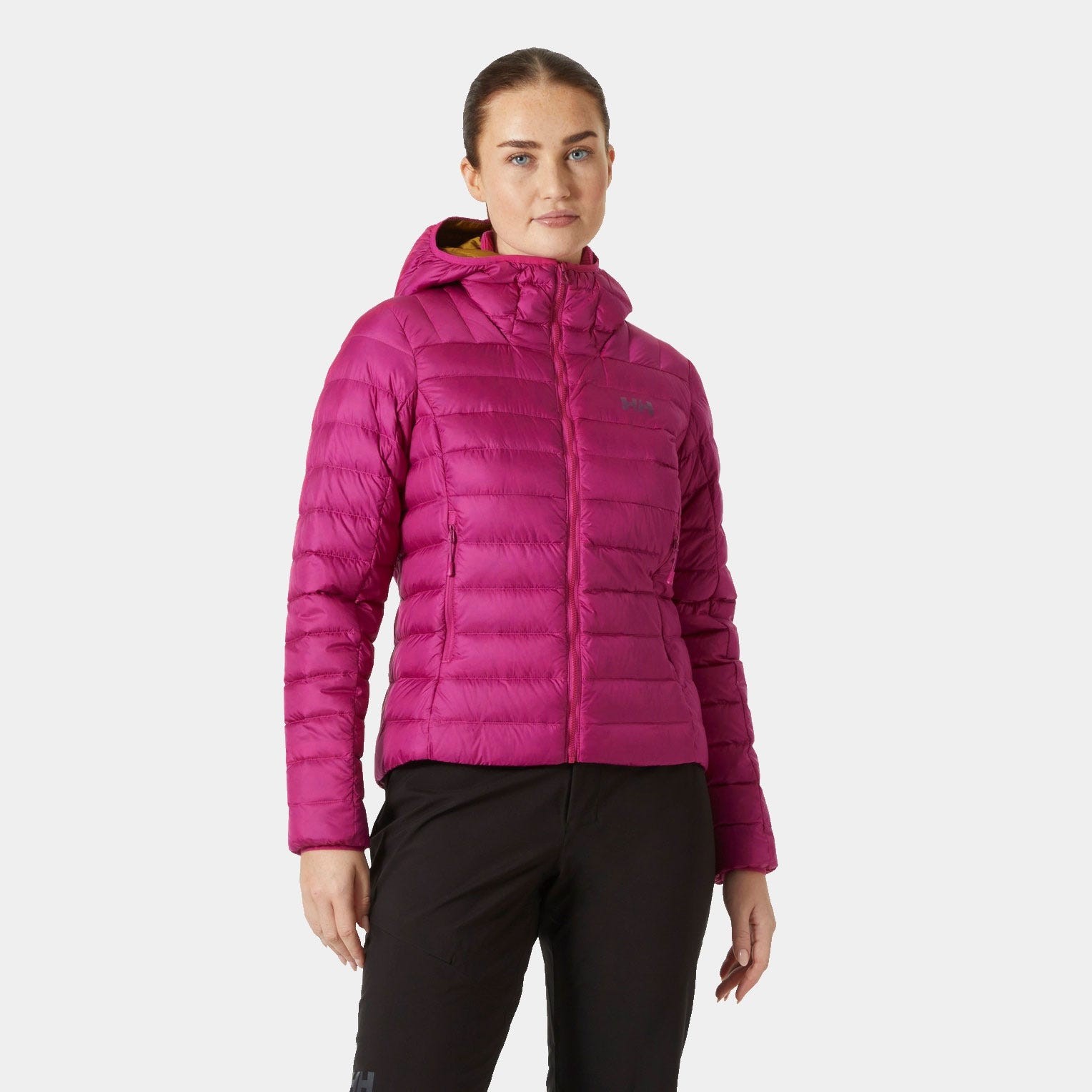 Fuchsia puffer jacket with a fitted silhouette, featuring a hood, zippered front, and lightweight, insulated material, ideal for outdoor activities.