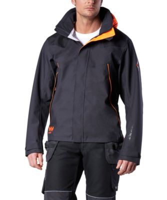 Men's black softshell jacket featuring an orange hood lining, zippered pockets, and reflective details, designed for durability and comfort in work environments.