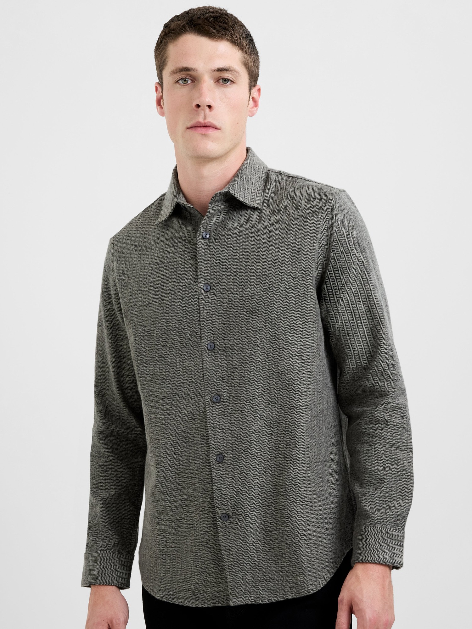 Grey herringbone long-sleeve shirt with a regular fit, featuring a button-up front and a classic collar, made from a textured fabric.