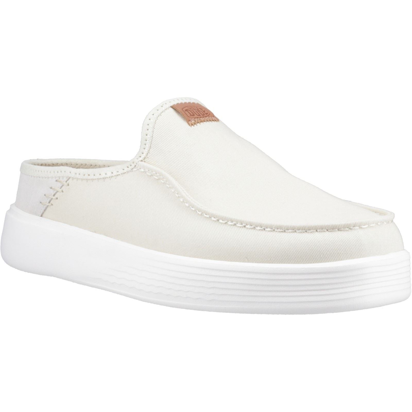 Men's HEYDUDE Austin Workwear Mule in Almost White and White, featuring a soft canvas upper, slip-on design, and a lightweight white rubber sole.