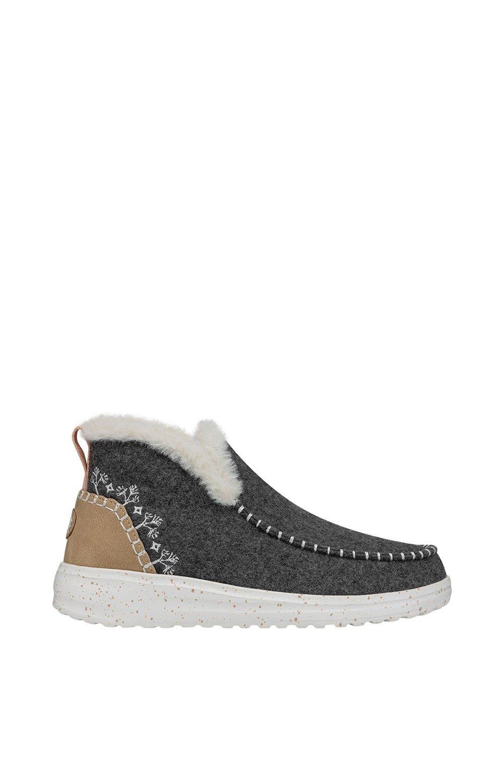 Grey wool faux shearling boots with a cozy white fur lining, decorative stitching, and a beige accent on the heel, featuring a textured white sole.