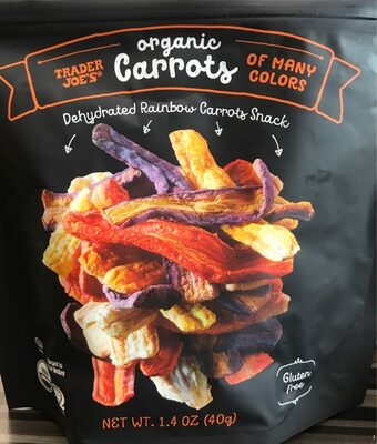 Colorful dehydrated carrot snacks in various hues, including orange, purple, and yellow, packaged in a black bag labeled "Organic Carrots of Many Colors" by Hilly.