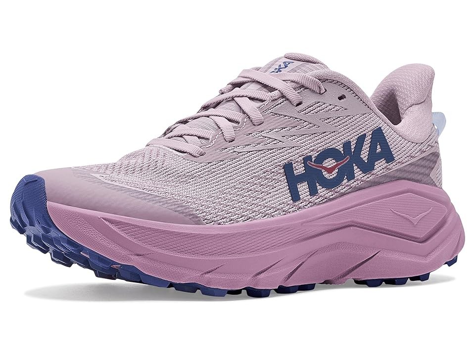 Women's HOKA Challenger 8 shoes in Fragrant Lilac and Berry Mauve, featuring a breathable mesh upper, thick cushioned sole, and rugged outsole for traction.